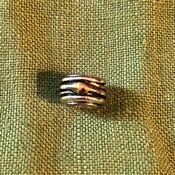 Pandora silver charm with gold accents, wrapped/stacked design, 1/4” x 1/2” - Picture 6 of 6